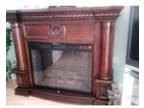 Electric fire and mahogany suround. Beautiful electric....